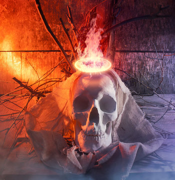 Skull with cloth and fire.