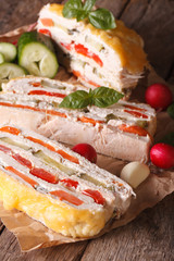 Sliced chicken casserole and vegetables vertical