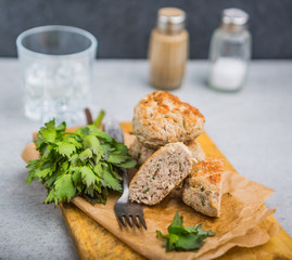 Meatballs with parsley on the kitchen board. Selective focus