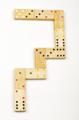 Number 7 arranged from wood dominoes tiles isolated