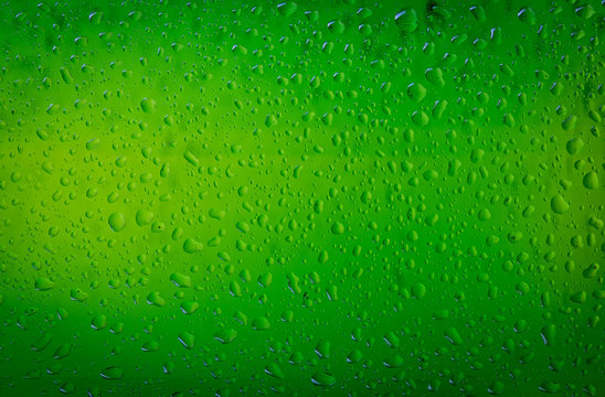 Texture water drops on the bottle of beer. Beer background