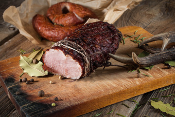Smoked ham on a chopping board.