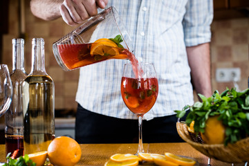 Man pours home sangria