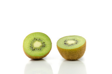 Kiwi fruit sliced segments on white background