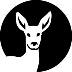 Roe deer in front of moon