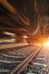 Obraz premium Cargo train platform at sunset with container