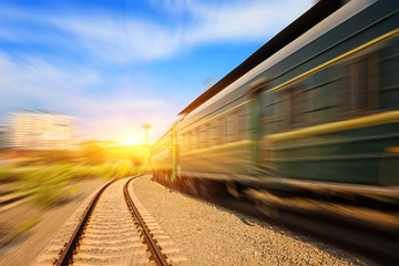 Naklejka premium Cargo train platform at sunset with container