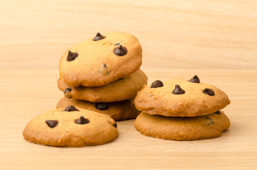 Chocolate chip cookies on wooden background