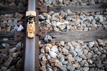 Vintage train toy model on rail.