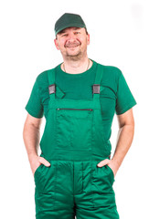 Worker in green overalls.