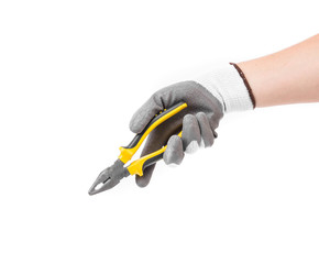 Hand in gloves holding pliers.