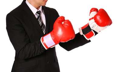 Businessman with boxing gloves isolated on white