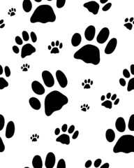 Seamless pattern with black silhouettes of trace of cats, vector