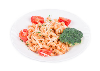 Italian pasta with broccoli and tomatoes.
