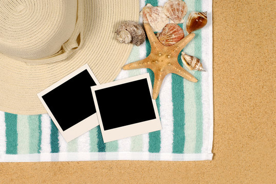 Two blank polaroid style photo frame print on a summer vacation tropical holiday beach with starfish and seashell photo space for copy text 
