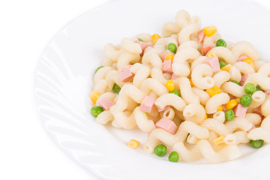 Pasta cavatappi with vegetables and sausage.