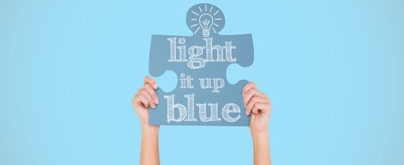 Composite image of hands showing jigsaw puzzle