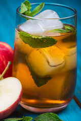 Refreshing apple and mint juice with ice
