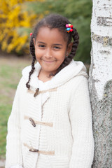 Pretty african girl with winter clothes
