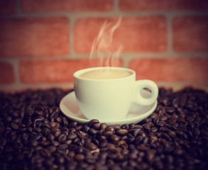 Cup of coffee and coffee beans