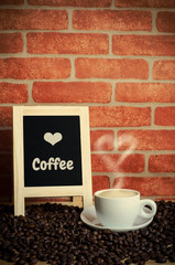 Coffee and coffee beans with chalk board