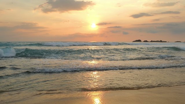 beautiful landscape with tropical sea sunset on the beach 4k