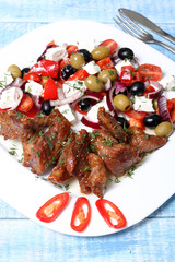 fried meat and vegetable salad