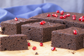 Brownie pieces on a wooden board