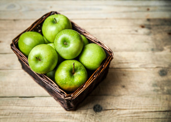 fruit. apples in a basket on wooden table