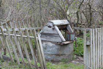 Old well for water on a cemetery