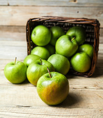fruit. apples in a basket on wooden table