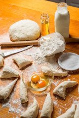 hand made bread dough cut and prepare into bread rolls
