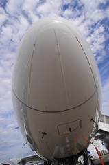 The nose of the aircraft on the sky background