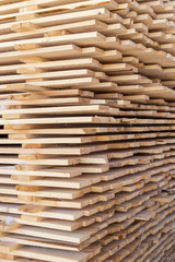 pile of cut wood for construction texture background pattern