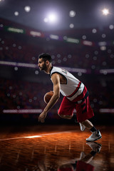 Fototapeta premium red Basketball player in action