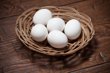 Eggs on a wooden rustic table