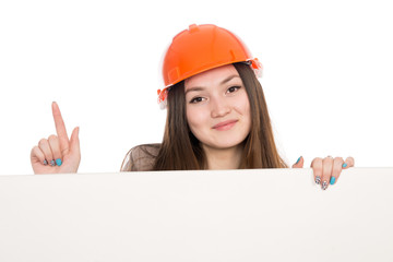 Girl builder in helmet showing thumbs up with blank banner.