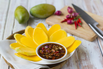 Thai style dessert :nMango with Sweetened Fish Sauce