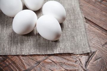 Eggs on a wooden rustic table