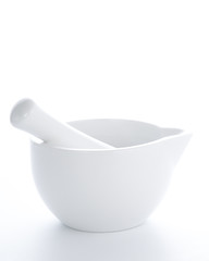 white porcelain mortar and pestle set isolated 