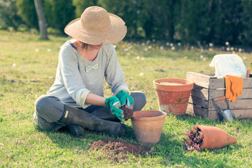 young woman working in garden