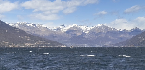 Lake of Como with snow-capped mountains.