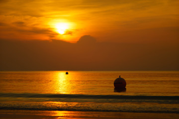 Naklejka na ściany i meble Sunset in Ao manao beach,Thailand.