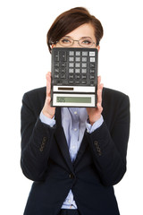 Businesswoman with SOS writing on calculator.