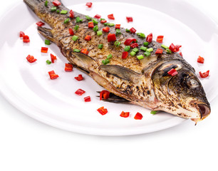 Fried fish with onion and pepper.