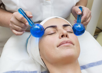 Naklejka premium massage and facial peels at the salon cosmetics