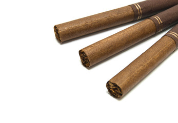 some cigarettes on white