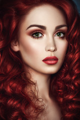 Fototapeta premium Portrait of beautiful redhead woman