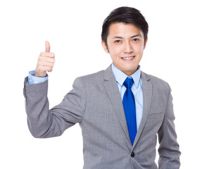Showing thumb young Asian business man