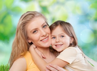 Obraz premium Mom. CLoseup portrait of happy white mother and young daughter